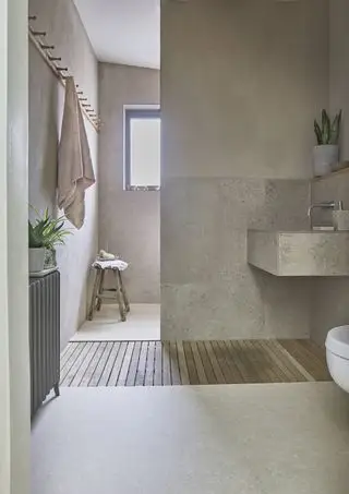 bagno neutro con pavimento in vinile, stile essenziale, stanza a pavimento sullo sfondo