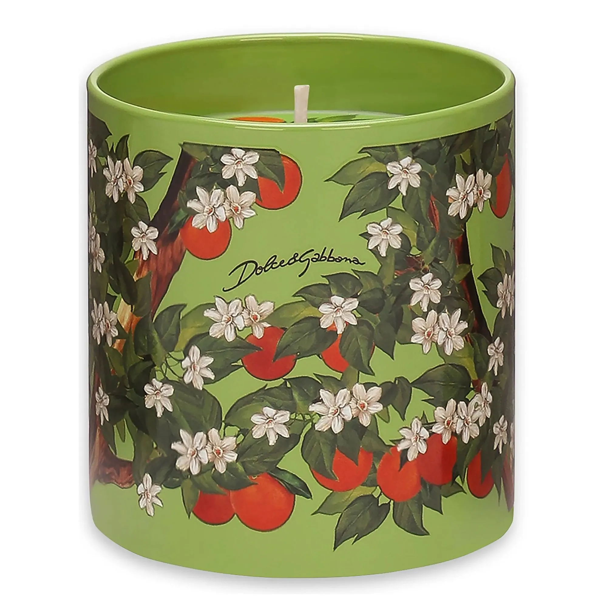 Zielona świeca z wzorami liści pomarańczy i kwiatów jaśminu.' loading='lazy' title=