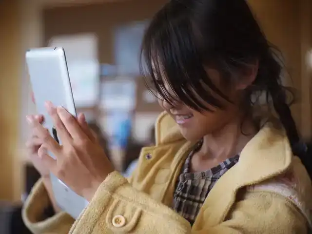 Young Girl on Tablet