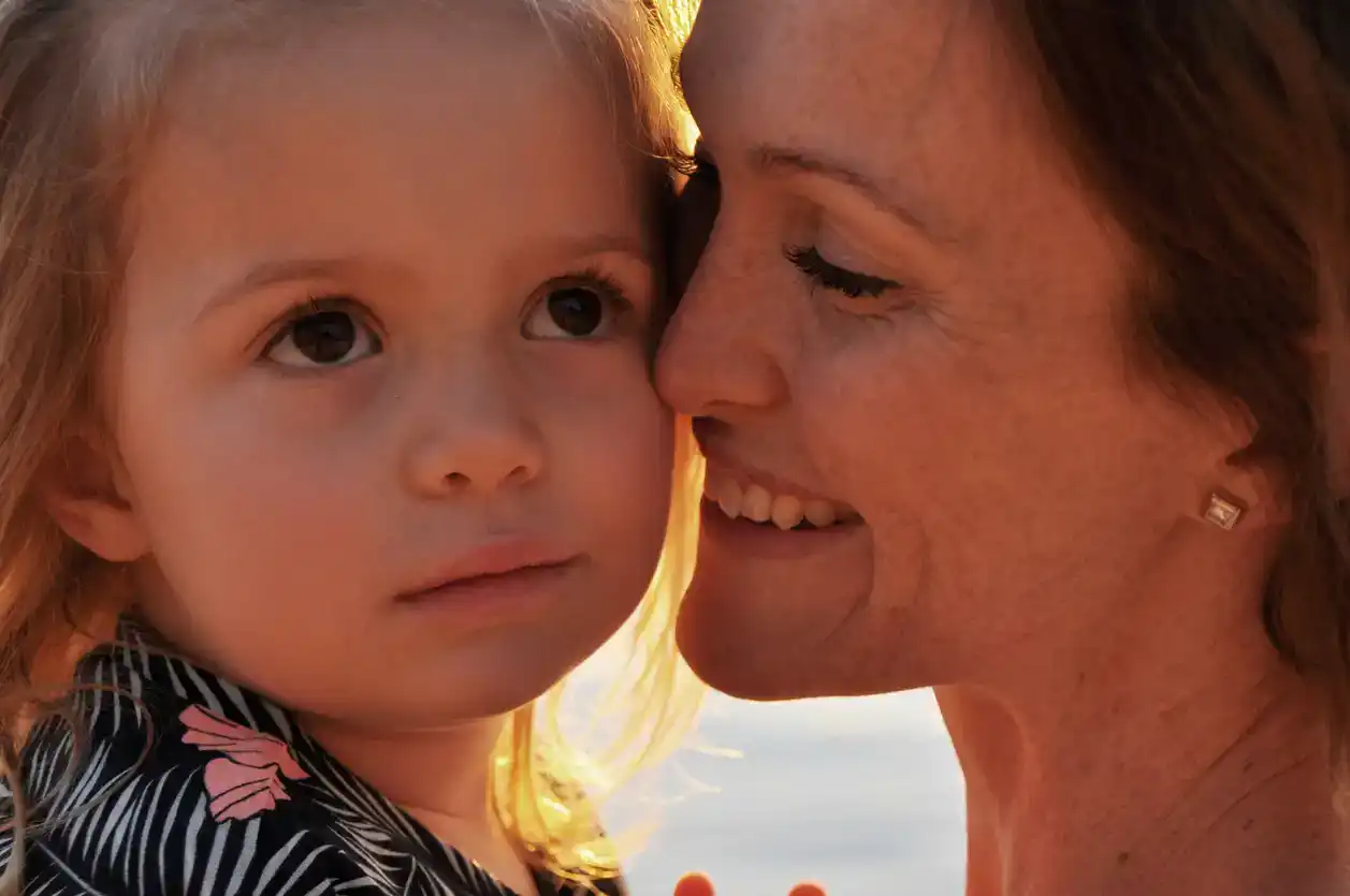 Mother smiling at her daughter