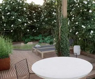 プライバシーを確​​保するために生け垣に囲まれた埋め込み型のホットタブ