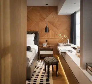 Bureaux cachés dans une chambre revêtue de bois