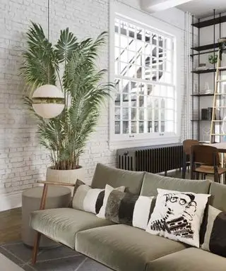 緑のベルベットのソファのあるモダンなリビング ルーム