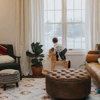 Hnedý kožený otoman Wayfair