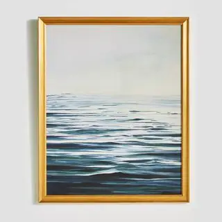 Uma impressão de água em uma moldura dourada