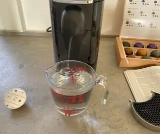 Nespresso Vertuo Plus מנקה מים