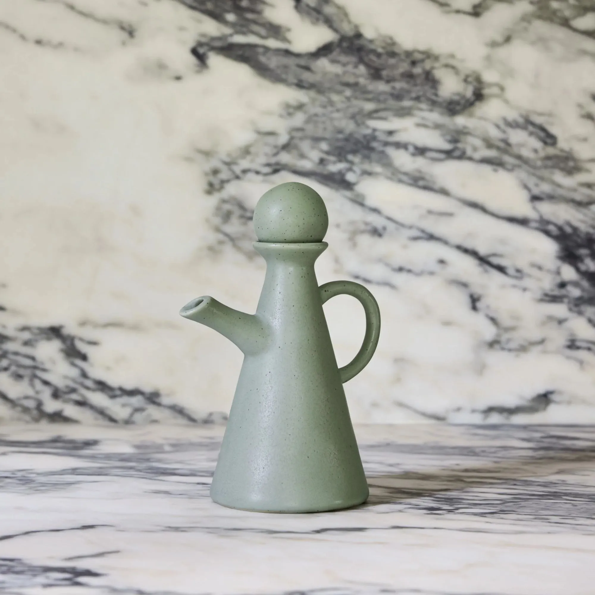 קרוט שמן ירוק בהיר עם טופר כדורי' loading='lazy' title=