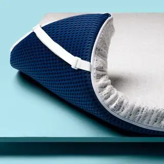 Surmatelas haute densité ViscoSoft Select sur fond bleu.