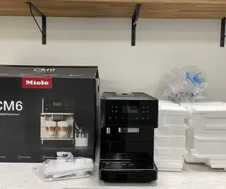 Machine Miele CM 6160 avec boîte
