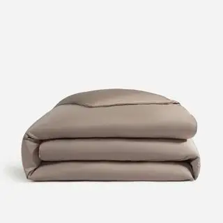 Meilleure image de draps pliés dans un coloris neutre