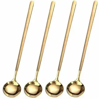 Vier goldene lange Teelöffel