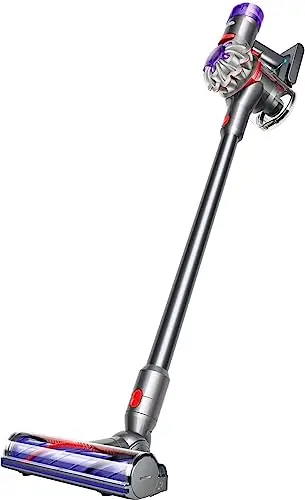 Un aspirateur sans fil Dyson Outsize en Nickel/Rouge