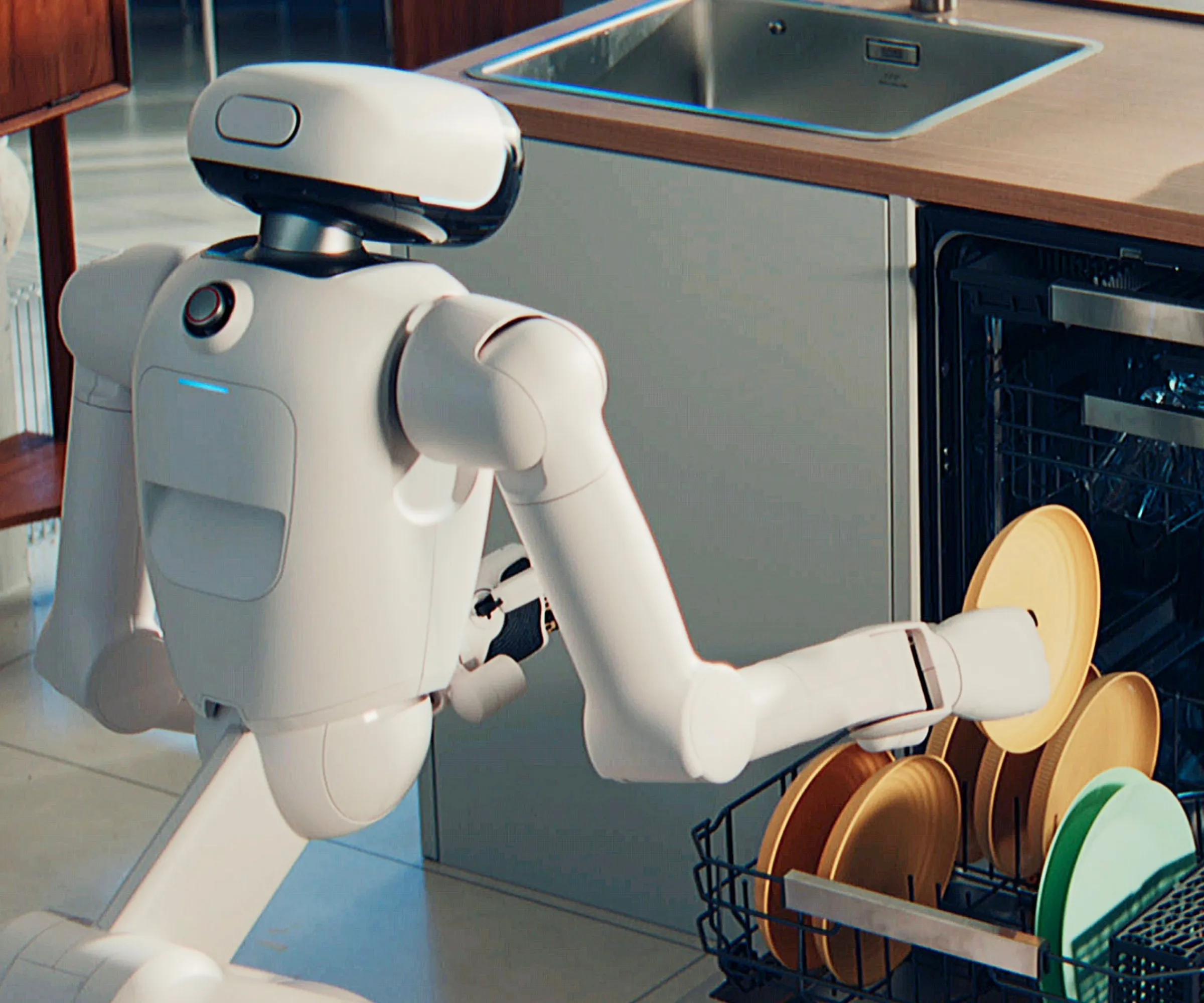 Zmywarka ładująca LG CLOiD z pomarańczowym talerzem w dłoni' loading='lazy' title=