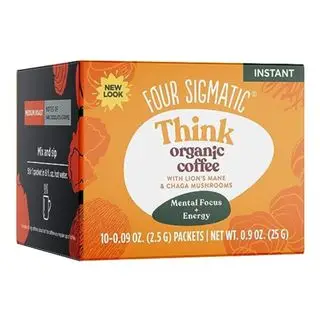 Una scatola arancione di caffè Four Sigmatic Think Mushroom